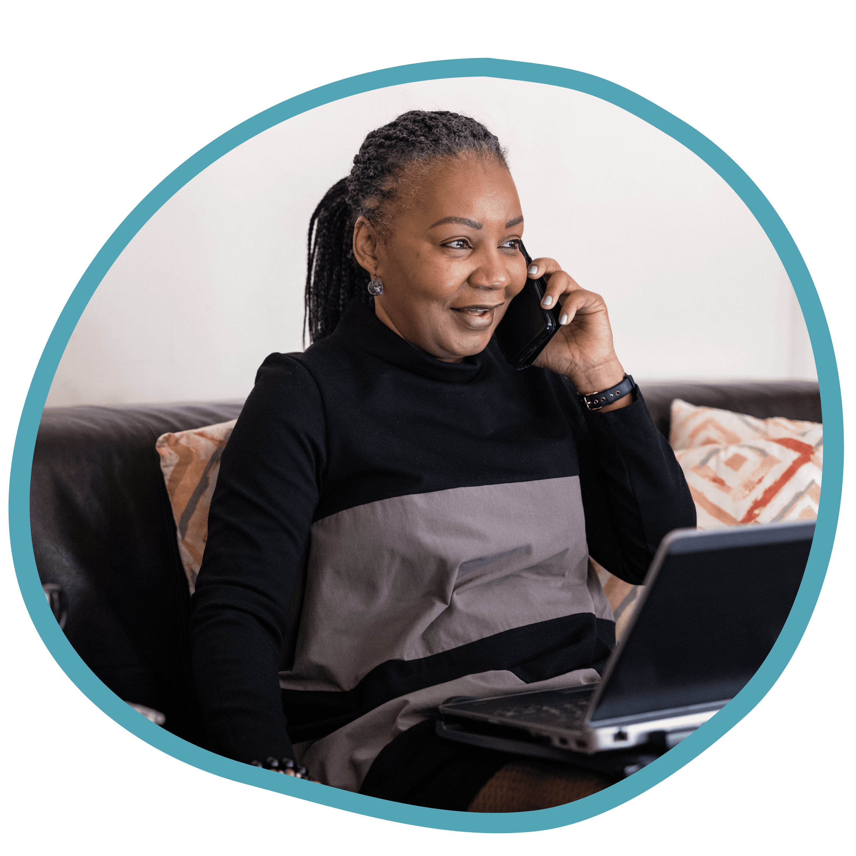 Female carer working on the phone and laptop